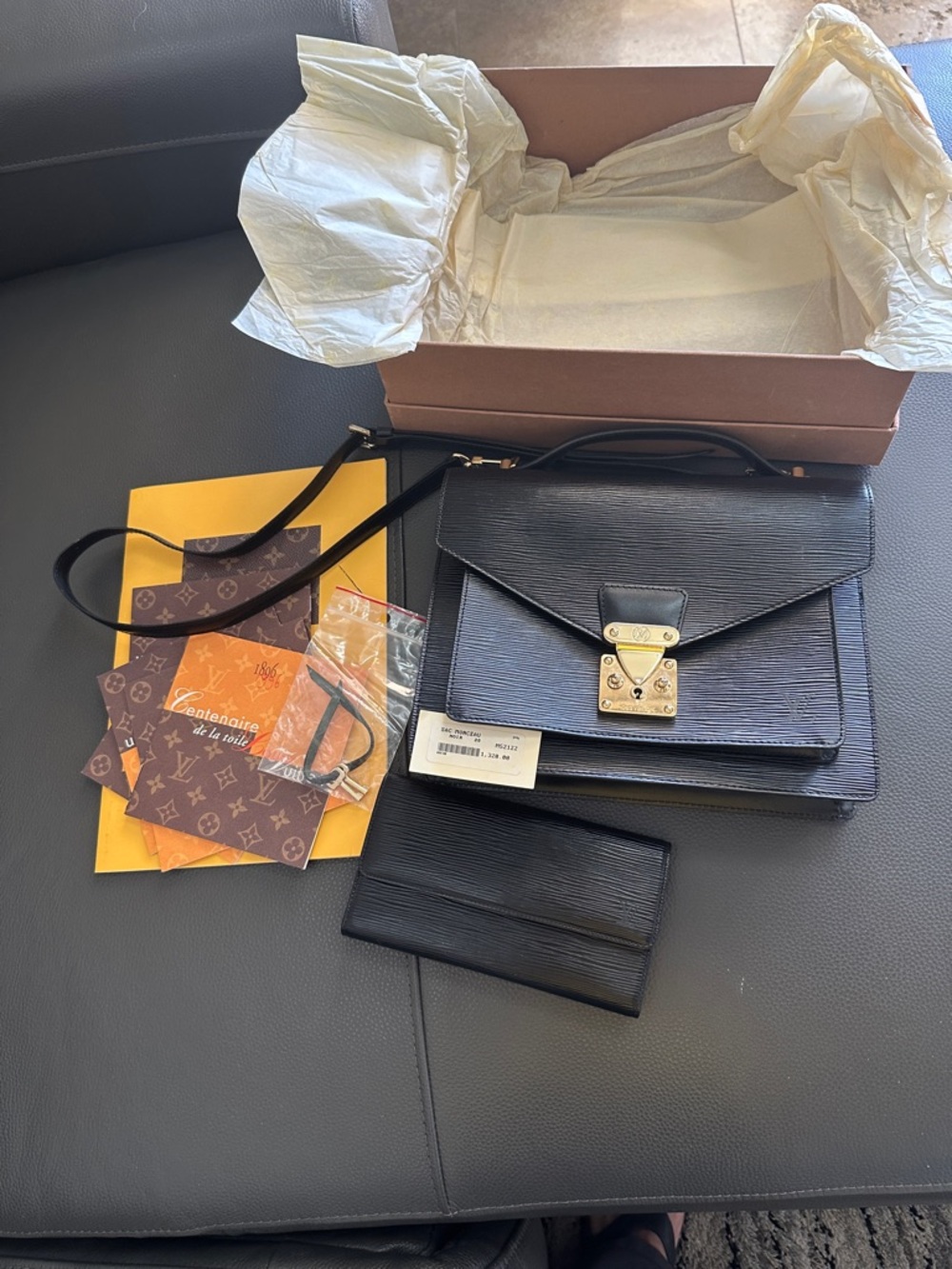 Genuine Louis Vuitton Monceau Epi Leather purse with matching Epi wallet.